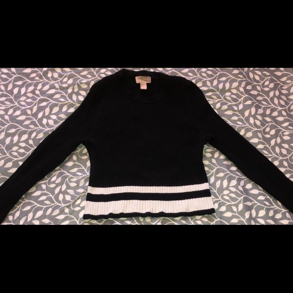 A cute black stretchy crop top that’s thick